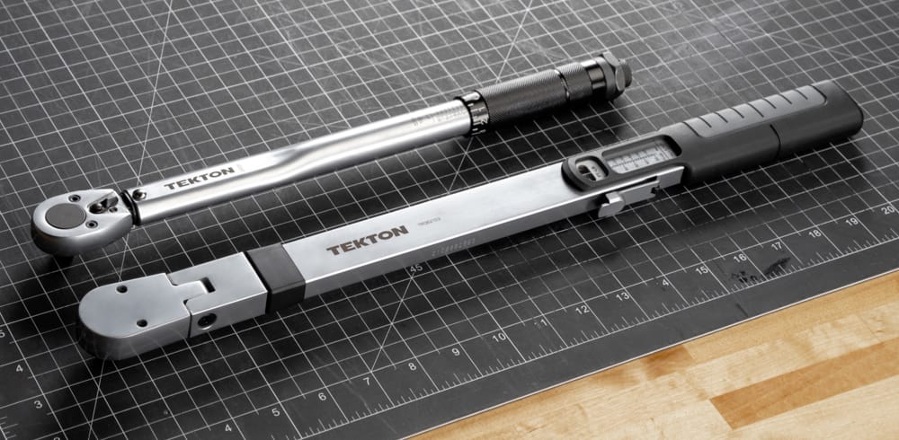 TEKTON Micrometer and Split Beam Torque Wrenches on a Table
