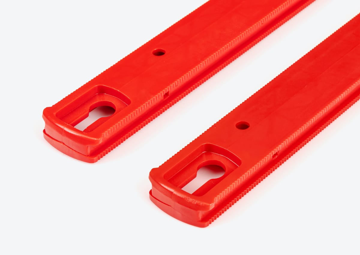 Two red socket rails without clips